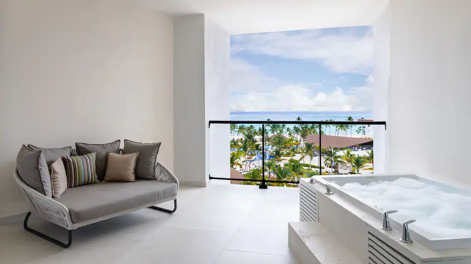 Private balcony with outdoor jetted tub and ocean views in the Club Ocean View One Bedroom Grand Master Suite.