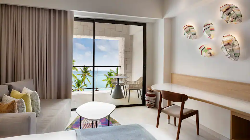 Club Oceanfront Junior Suite Double living area with oceanfront balcony at Hyatt Ziva Cap Cana.