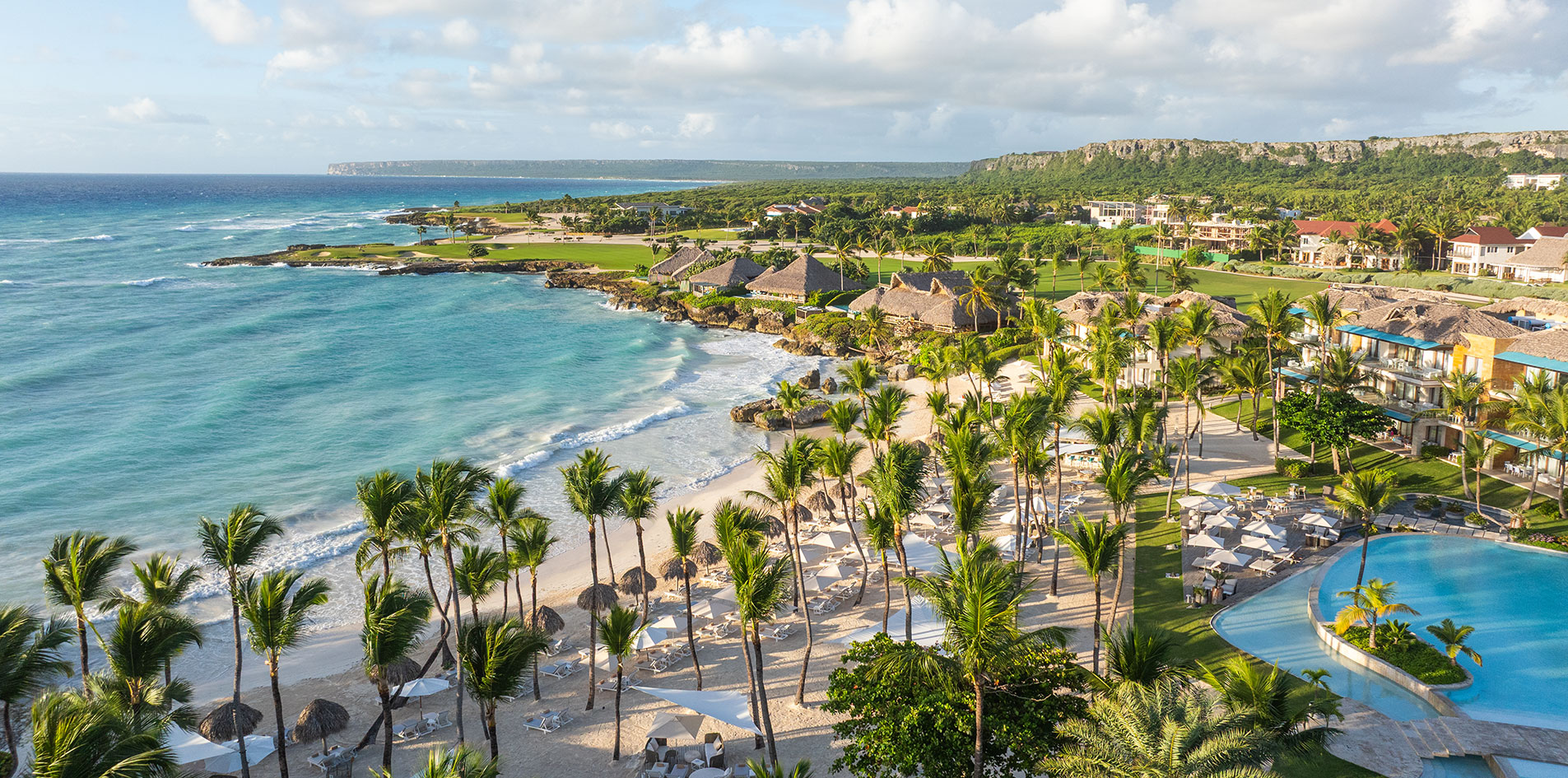 Eden Roc Cap Cana luxury boutique resort in Cap Cana, Dominican Republic with Mediterranean architecture, private beach, and exclusive marina setting.