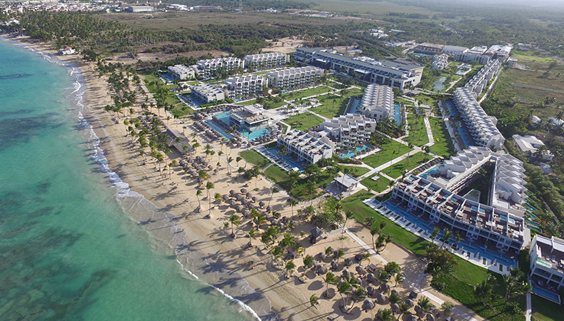 Excellence El Carmen adults-only all-inclusive resort in Punta Cana with luxury suites, beachfront pools, and romantic Caribbean setting.