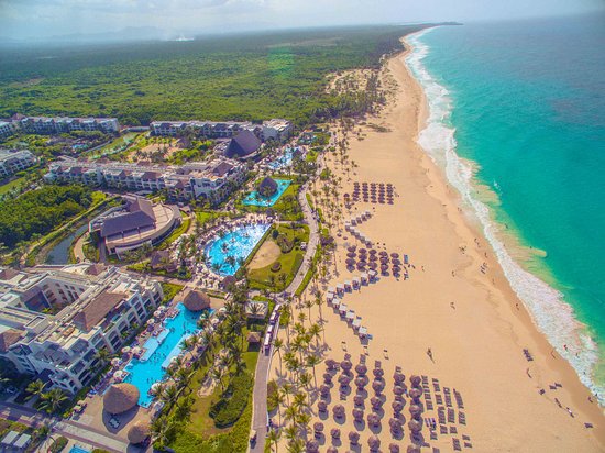 Hard Rock Hotel and Casino Punta Cana mega-resort all-inclusive with expansive pools, casino, golf course, and entertainment complex in Dominican Republic.