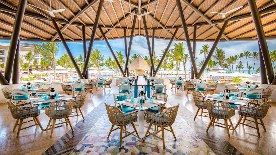 Navigator Grill at Hyatt Ziva Cap Cana featuring casual open-air dining, grilled specialties, and a relaxed poolside atmosphere near the beach.