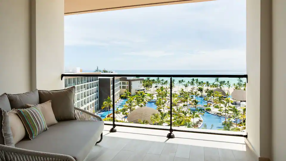 Private balcony with ocean and resort views from the Ocean View Junior Suite Double at Hyatt Ziva Cap Cana.