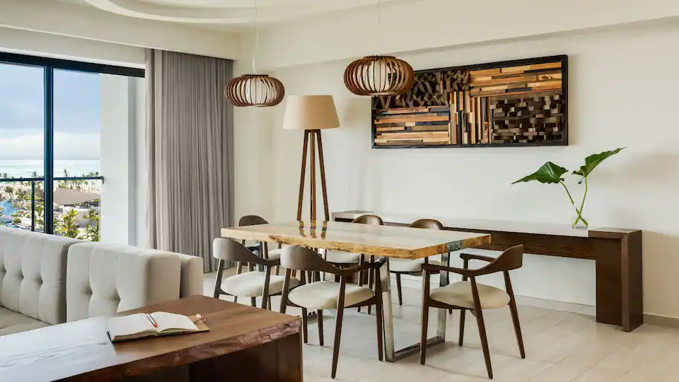 Separate dining room with seating for guests in the Presidential Suite at Hyatt Ziva Cap Cana.