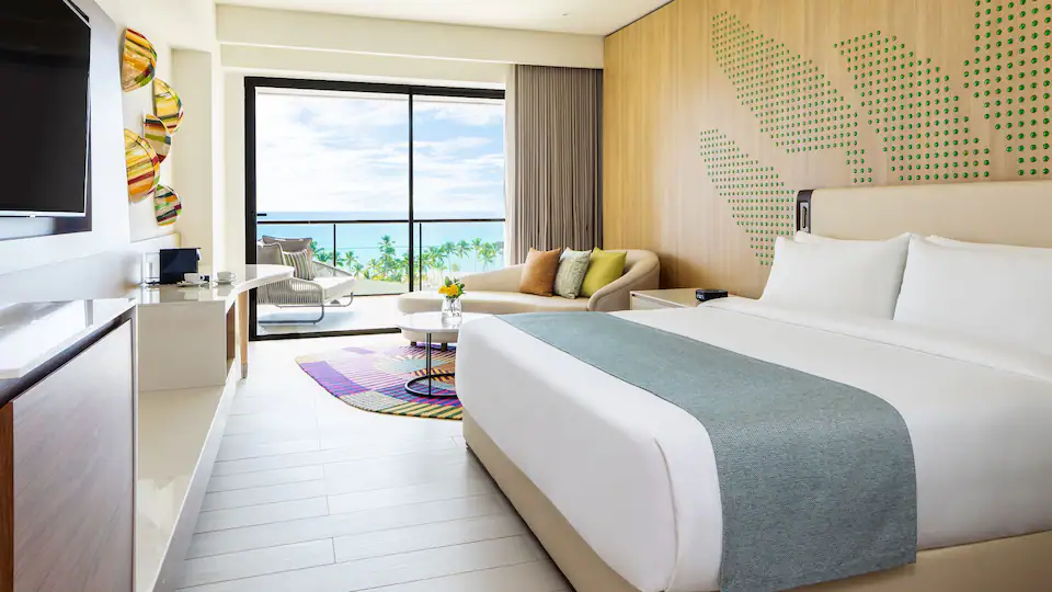 King bedroom with ocean-view balcony access in the Presidential Suite at Hyatt Ziva Cap Cana.