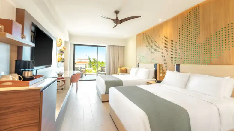 Resort View Junior Suite Double with two queen beds and private balcony at Hyatt Ziva Cap Cana.
