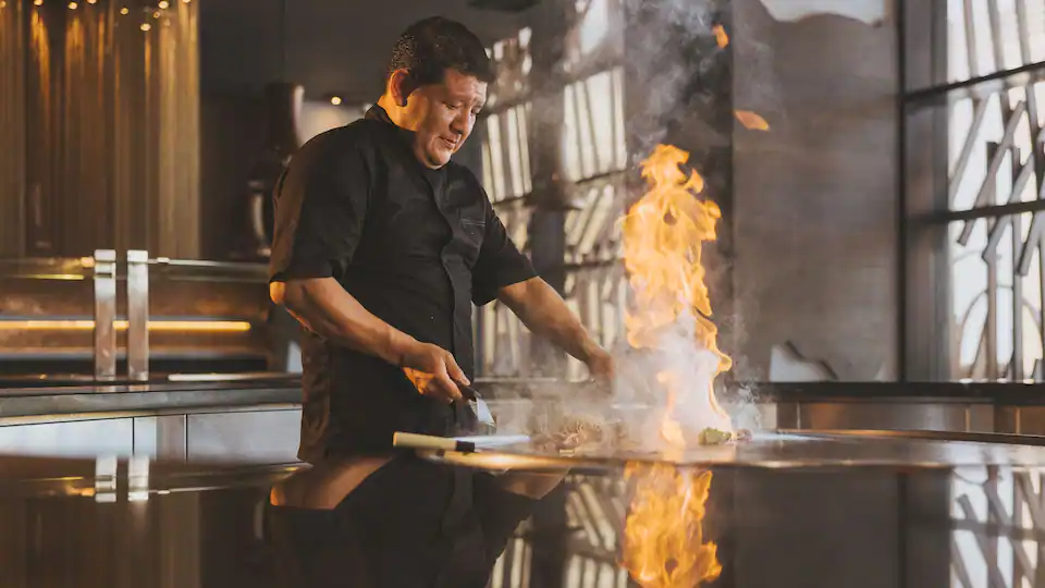 Tempest Table Asian restaurant at Hyatt Ziva Cap Cana featuring modern décor, interactive teppanyaki dining, and expertly prepared Asian-inspired cuisine.