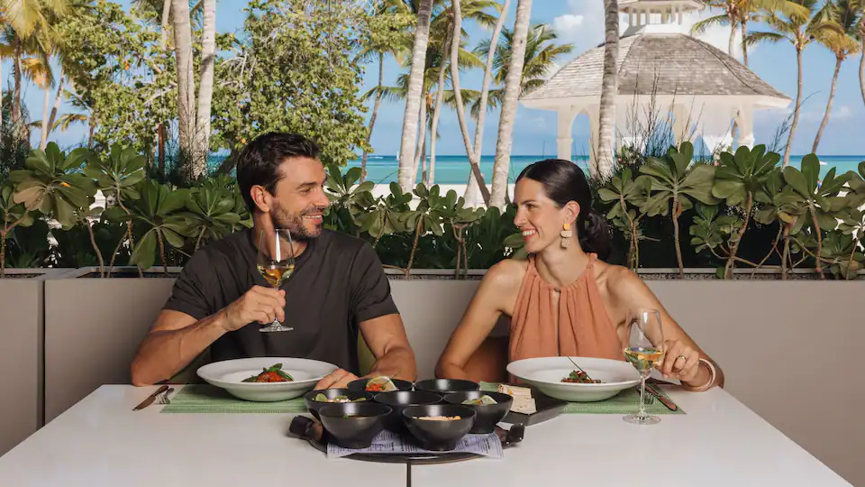 The Chinola beachfront restaurant and bar at Hyatt Ziva Cap Cana featuring Caribbean-inspired cuisine, tropical cocktails, and stunning ocean views.